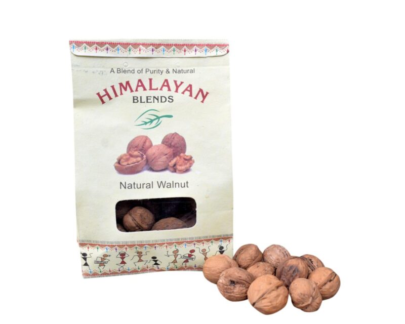 Organic Himalayan Walnuts in shell on a wooden table Close-up of handpicked organic walnuts from Himachal Pradesh Natural, sun-dried walnuts from Himalayan Blends Chamba Healthy organic walnuts in a rustic bowl – chemical-free and fresh